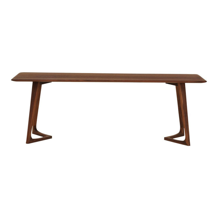 Wooden dining table in rich brown finish with a sleek, modern design and unique triangular legs.