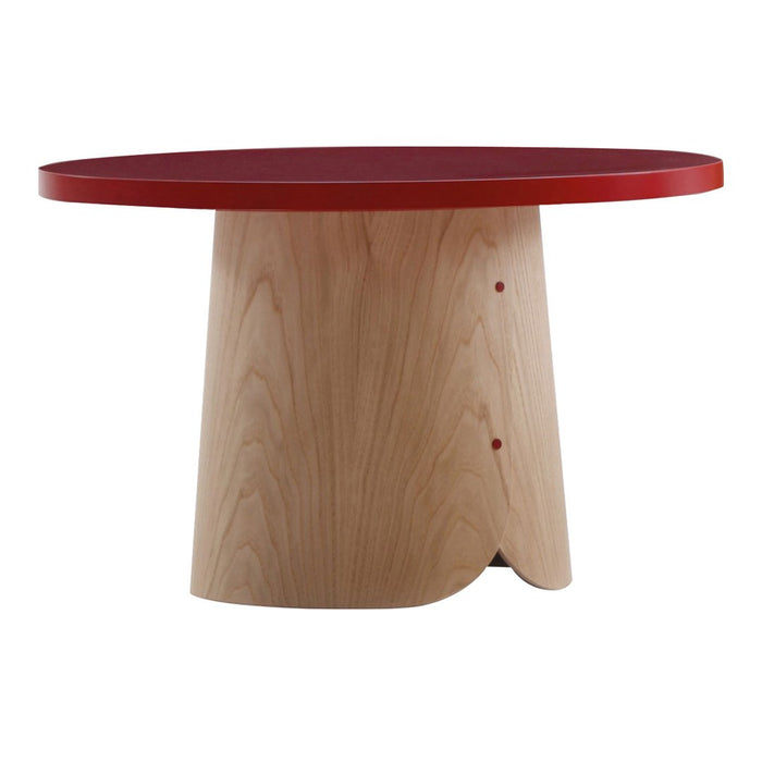 Round wooden table with a natural wood finish and a vibrant red tabletop accent.