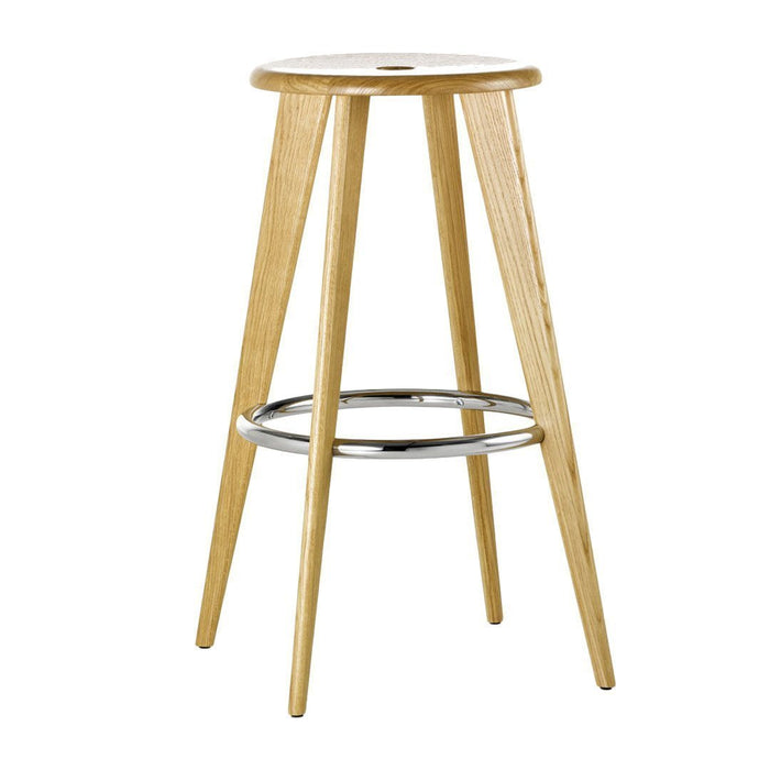 Natural wood bar stool with a light oak finish and chrome footrest. Simple, modern design with a smooth surface.