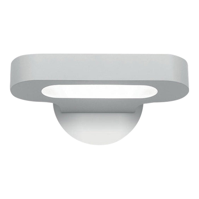 Sleek, modern wall light in smooth matte white finish with a minimalist oval shape and circular mount.