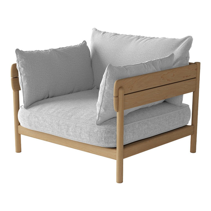 Light grey, textured cushions on a natural wood frame. Cozy and modern chair design for stylish interiors.