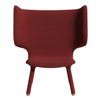 Red textured chair with high back and curved arms, featuring a minimalist design. Perfect for modern interiors.