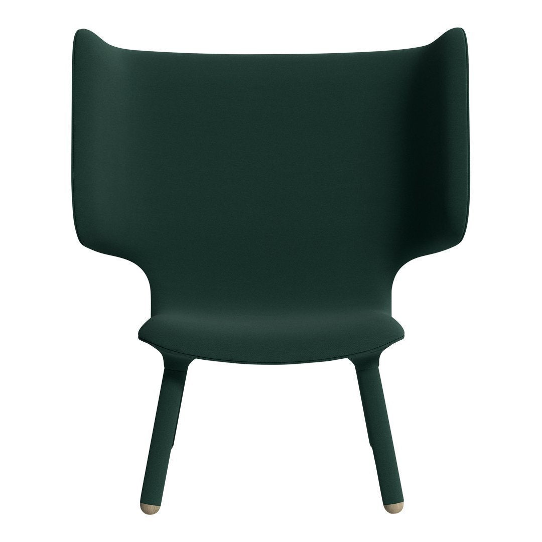 Forest green chair with smooth, curved lines and minimalistic design, featuring tapered legs in natural wood.