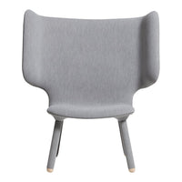 Light gray fabric armchair with a smooth texture and minimalist design.