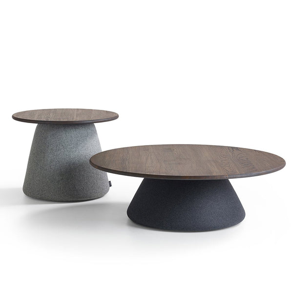 Two modern round coffee tables featuring a dark wood top with gray and black textured bases. 