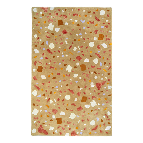 Terrazzo patterned area rug in warm beige, featuring scattered shapes in orange, pink, white, and subtle earthy tones.