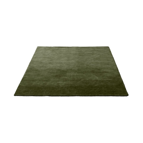 Solid olive green area rug with a smooth texture, perfect for adding a rich, earthy tone to any space.