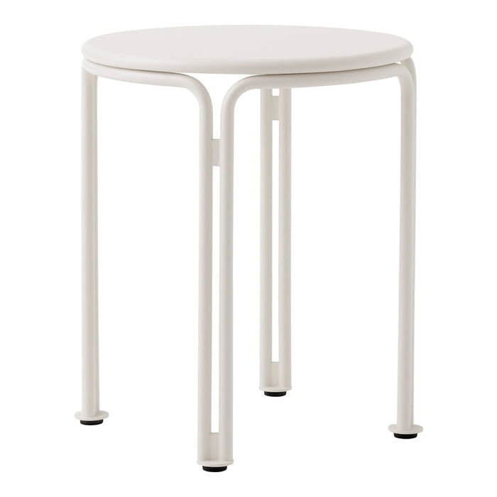 White round side table with a smooth finish and simple, modern design featuring sleek, curved legs.