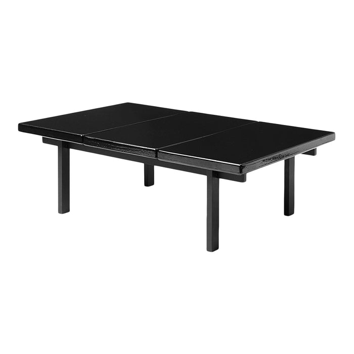 Black rectangular table with a smooth, minimalist design and clean lines, perfect for modern decor.