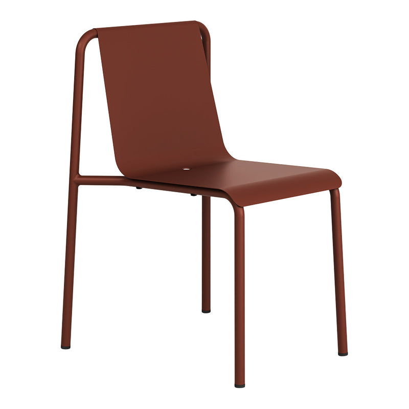 "Terra cotta dining chair with a sleek, minimalist design and smooth, matte finish."