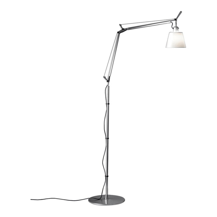 Sleek silver floor lamp with a minimalist design and a white shade, perfect for modern decor.