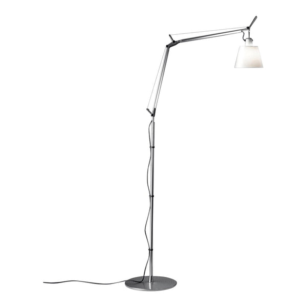 Modern floor lamp with a sleek black and silver design, featuring a white glass shade for a minimalist look.