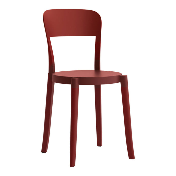 Vibrant red wooden chair with a minimalist design and smooth finish. Perfect for modern decor.