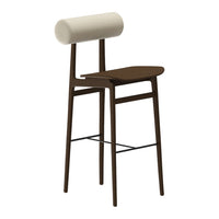 Modern bar stool in dark wood with a cylindrical white backrest; sleek design and minimalistic aesthetic.