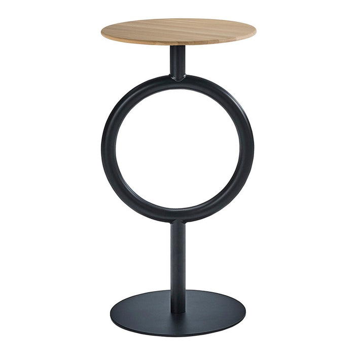 Modern black metal accent table with a circular design and a light wood top for a stylish contrast.