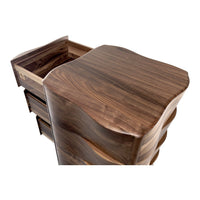Elegant walnut wood dresser with smooth curves and natural grain patterns in rich brown tones.