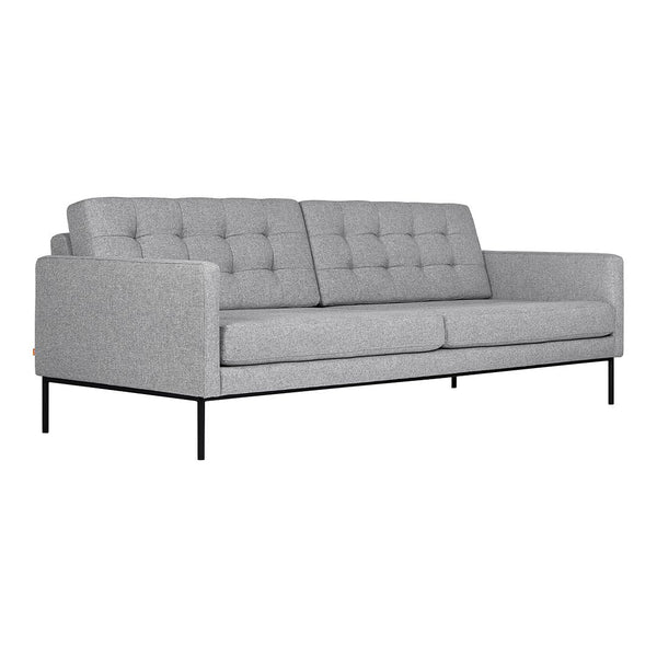 Gray upholstered sofa with tufted design and sleek black metal legs, perfect for modern interiors.