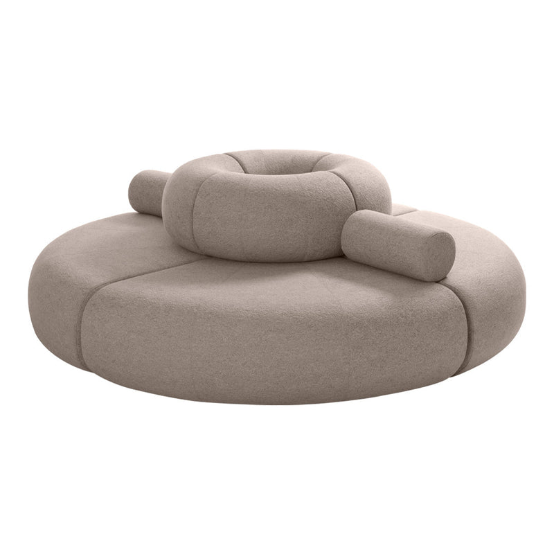 Round beige lounge chair with a smooth, textured fabric and cylindrical armrests, featuring a modern and minimalist design.