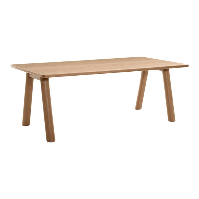 Light oak dining table with a natural wood finish and smooth, minimalist design. Ideal for modern interiors.