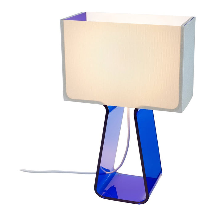 Modern table lamp featuring a white shade and a striking blue base. Clean lines with a sleek, minimalist design.