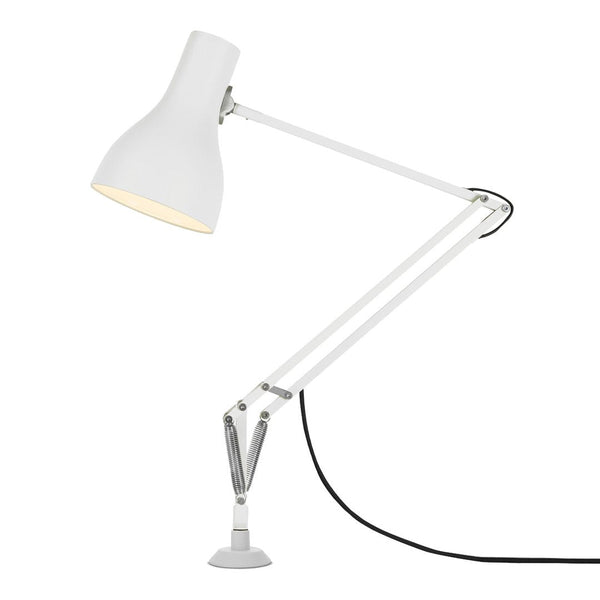 Adjustable white desk lamp with a sleek, minimalist design and subtle metallic accents. Perfect for modern spaces.