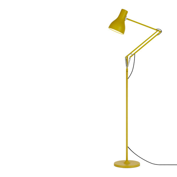 Bright yellow metal floor lamp with a sleek, modern design and adjustable shade for versatile lighting.
