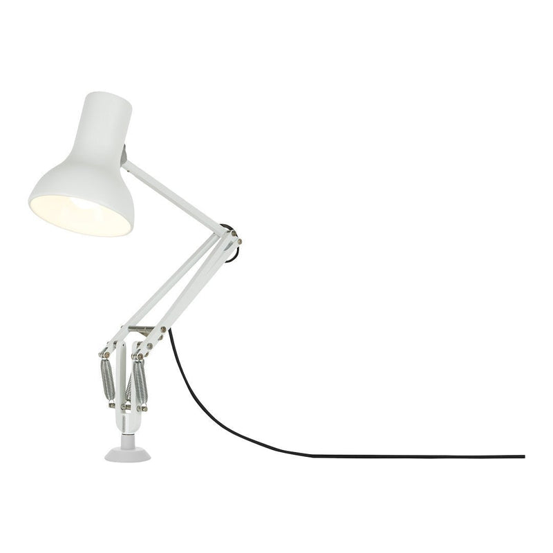 White industrial desk lamp with a sleek arm and black cord, featuring a minimalist design. Perfect for modern decor.