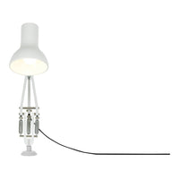 Modern white lamp with sleek design, featuring a cylindrical shade and a contrasting black cord.