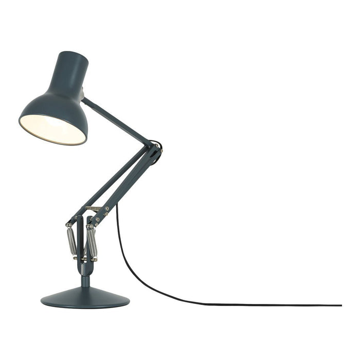 Blue adjustable desk lamp with a sleek, modern design and simple, minimalistic lines. Perfect for any workspace.