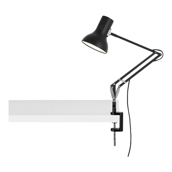Black adjustable desk lamp with a sleek design and metallic finish, featuring a minimalist and modern aesthetic.