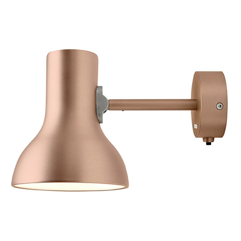 Rose gold wall lamp with a sleek, matte finish and simple, modern design. Perfect for stylish decor.