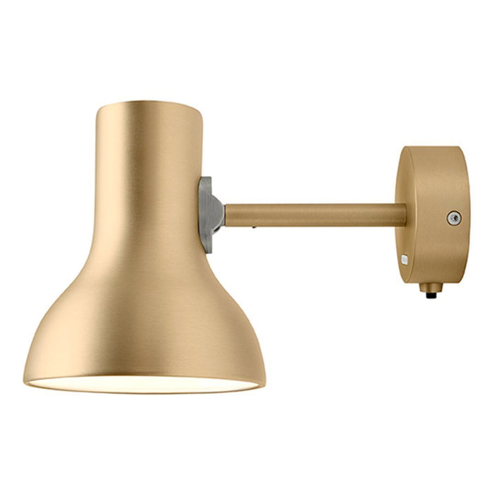 Matte gold wall sconce with a sleek bell shape and modern, minimalist design. Perfect for stylish lighting accents.