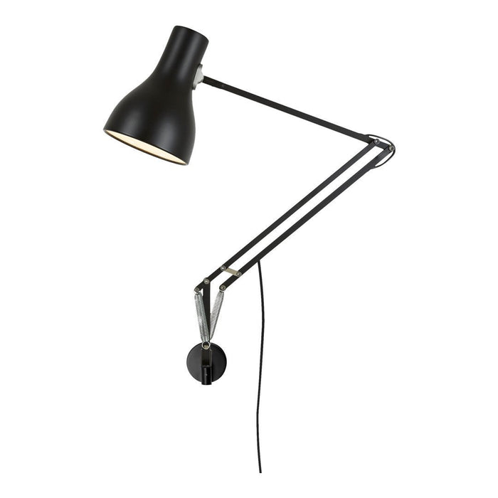 Black industrial wall lamp with sleek metallic accents and a minimalist design. Perfect for modern decor.