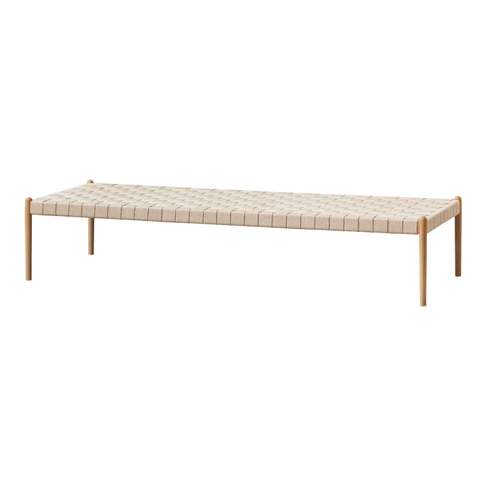 Neutral beige woven fabric with a simple grid pattern, paired with light natural wood legs. Ideal for modern decor.