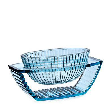 Stylish blue glass bowl with elegant ribbed patterns and a sleek, modern design. Perfect for home decor.