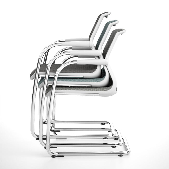 Stacked modern chairs in white and gray with sleek metallic frames, featuring minimalist design and clean lines.