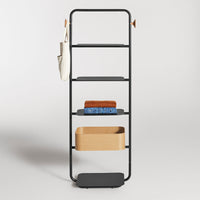 Black metal shelving unit with natural wood accents and a minimalist design, featuring patterned storage baskets.