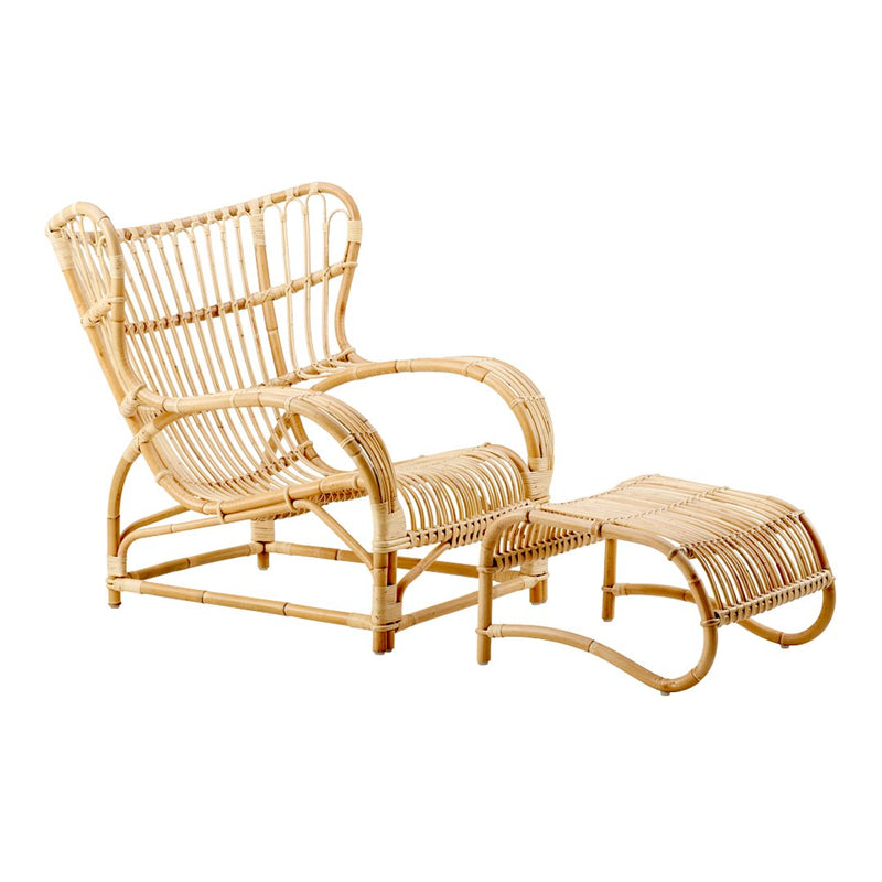 Natural rattan lounge chair and ottoman in a classic woven pattern, showcasing warm beige tones. Perfect for any decor.