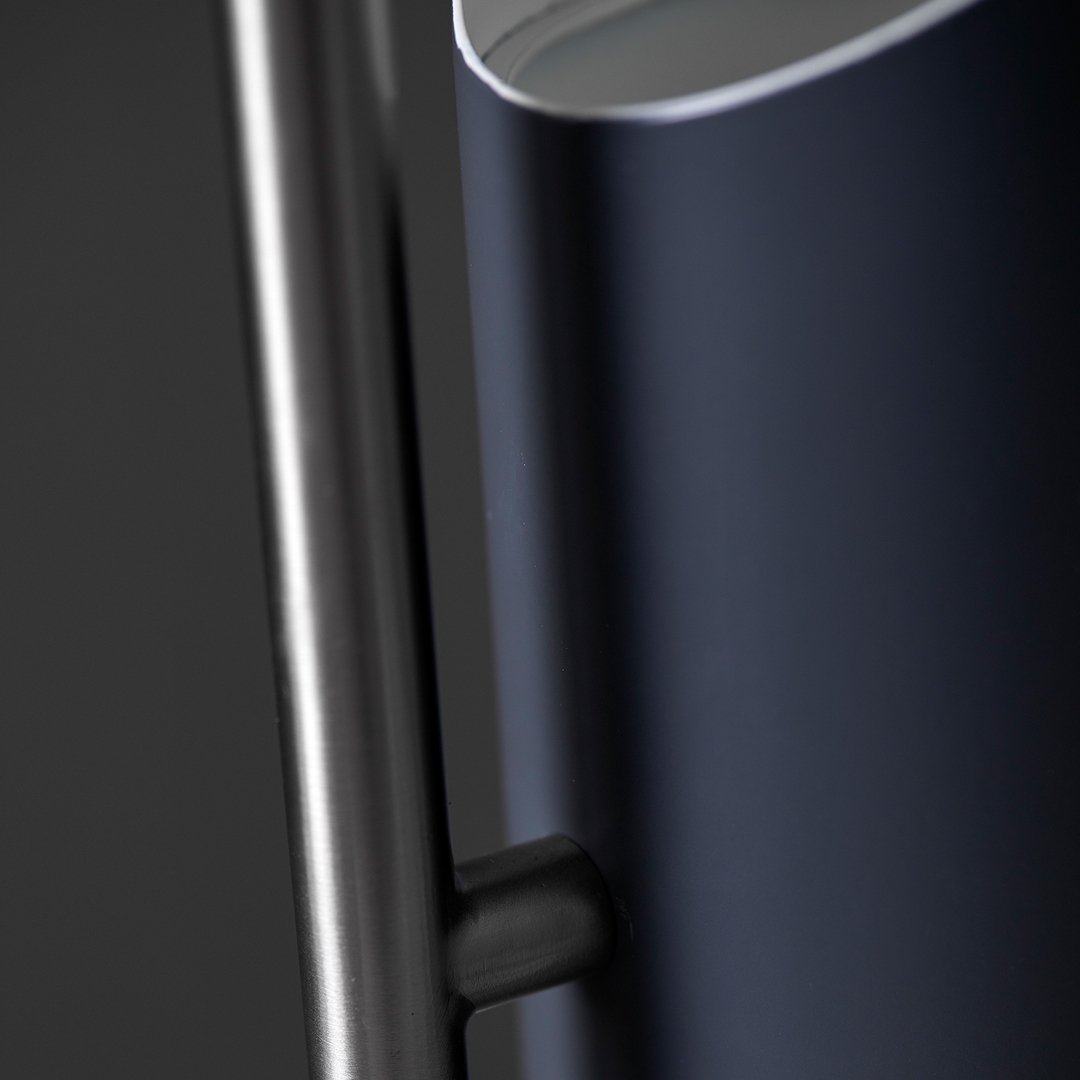 Sleek navy blue finish with a smooth metallic accent, showcasing modern design and elegant patterns.