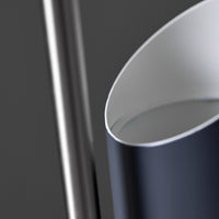Sleek silver and deep navy water pitcher with a smooth, curved design and a glossy finish.