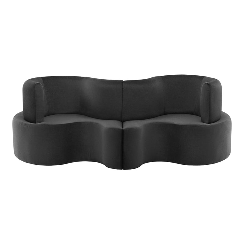 Black curved sofa with a smooth texture and modern design, featuring a minimalist aesthetic for stylish interiors.