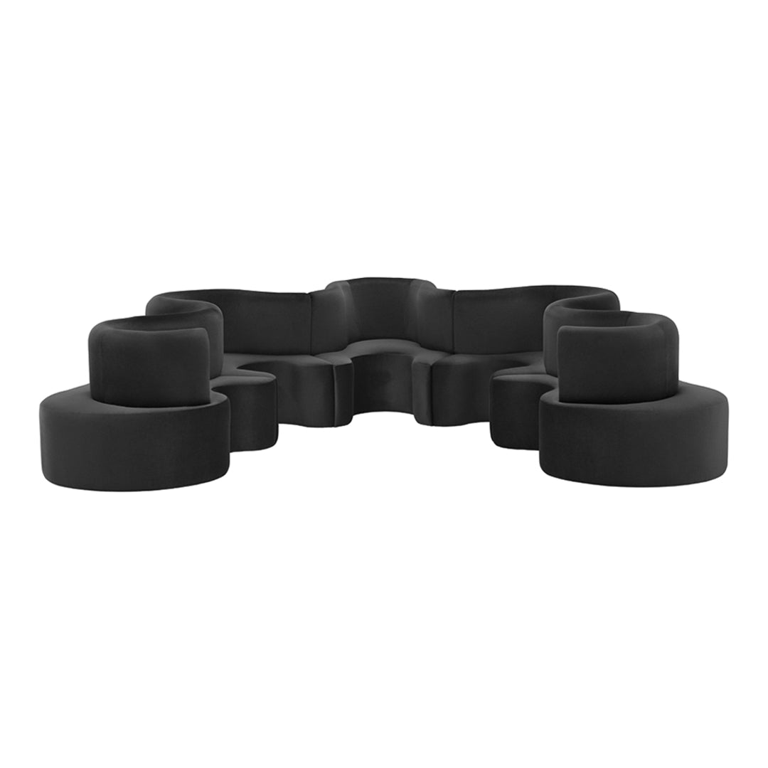Stylish black modular sectional sofa with smooth, curved shapes and soft velvet texture. Perfect for modern decor.