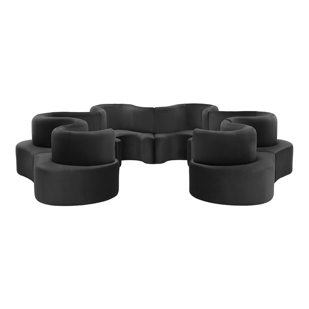 Modern black modular sofa with a unique wave pattern, perfect for striking interior designs.