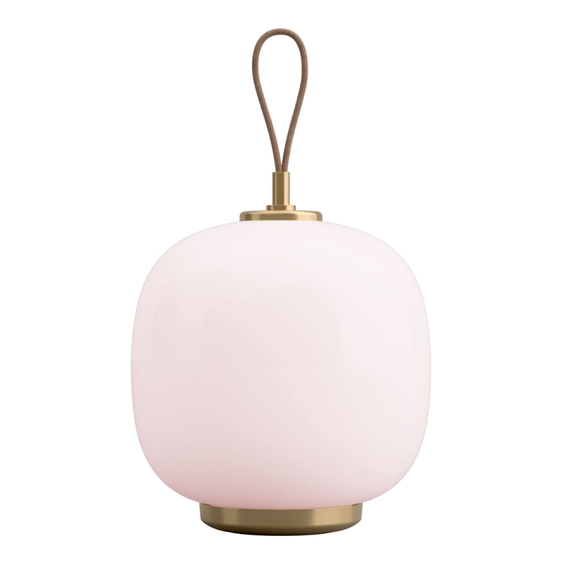 Soft pink glass lamp with a rounded shape and elegant brass accent. Ideal for modern decor.