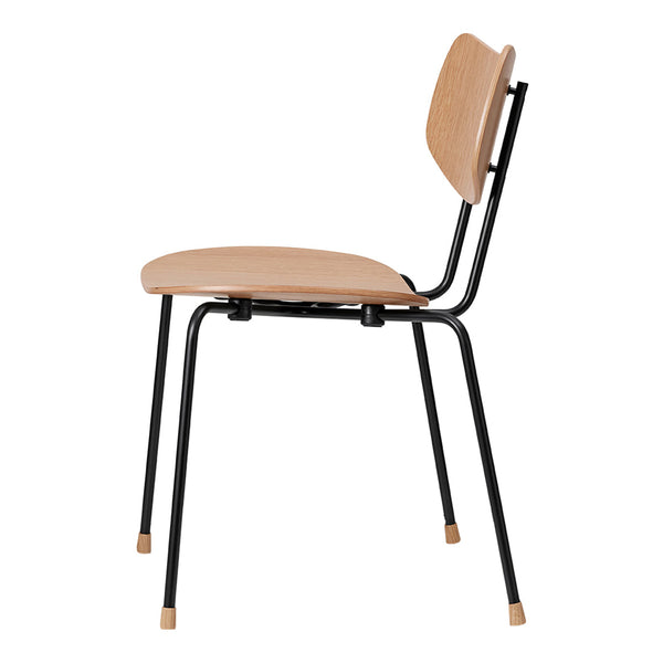 Minimalist wooden chair in natural wood tone with sleek black metal frame and subtle golden foot caps.