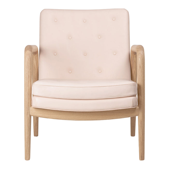 Blush pink upholstered armchair with button tufting and natural wood accents. Modern, minimalist design.