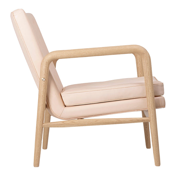 Light pink upholstered chair with a natural wood frame, offering minimalist design and soft color contrast.