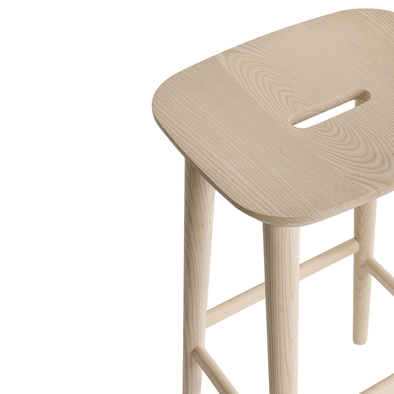 Light ash wood bar stool with a smooth, natural finish and minimalist design, featuring a unique cut-out shape.