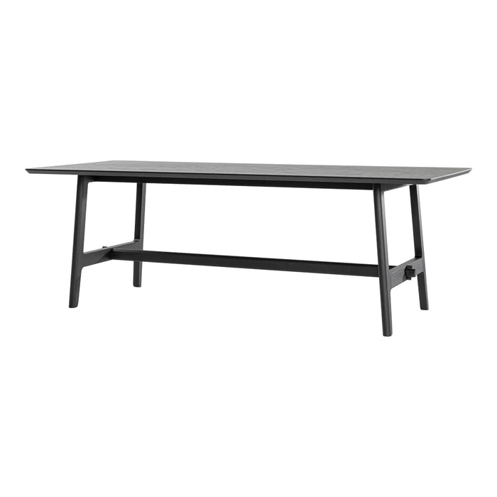 Black rectangular table with a sleek, smooth surface and minimalist design, featuring elegant straight legs.