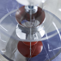 Transparent circular design featuring red and silver elements with a smooth, glossy finish.